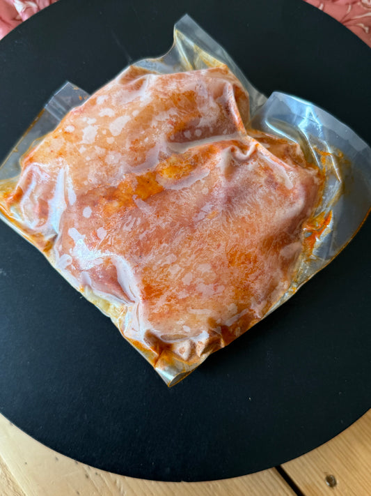 Scharrel kipdij, gekruid